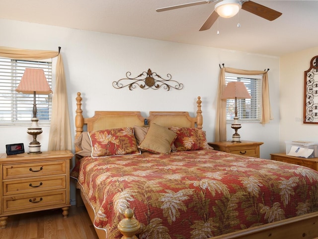 bedroom featuring ceiling fan and wood finished floors