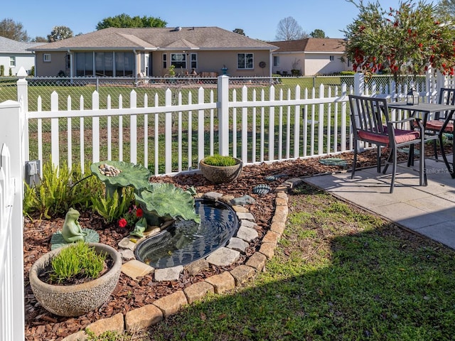 view of yard featuring a fenced backyard