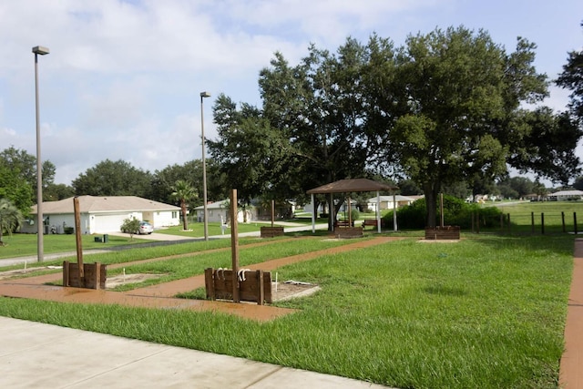 view of property's community featuring a gazebo and a yard