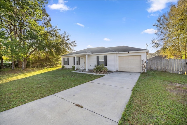 ranch-style house with a garage, a front yard, driveway, and fence