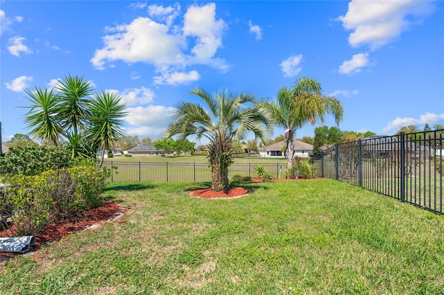 view of yard featuring fence