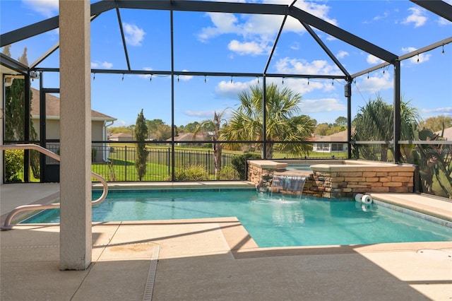 view of pool featuring a fenced in pool, fence, a lanai, an outdoor hot tub, and a patio