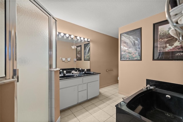 bathroom featuring tile patterned flooring, a stall shower, vanity, and a bath