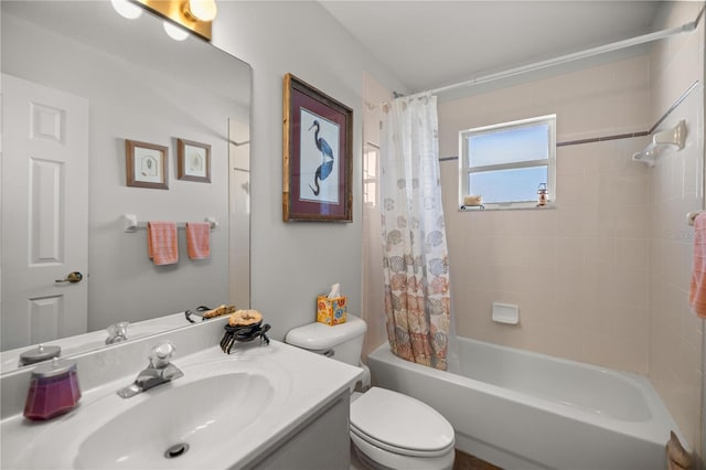 bathroom with vanity, toilet, and shower / tub combo with curtain