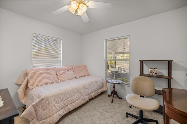 bedroom featuring ceiling fan and carpet flooring