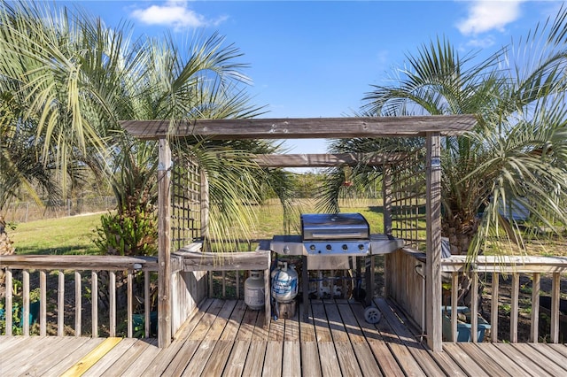 wooden deck featuring grilling area