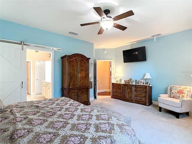 bedroom with baseboards, light colored carpet, visible vents, and ceiling fan