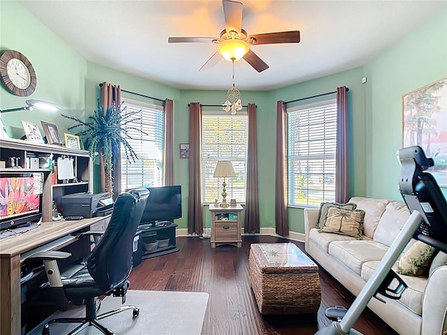 office space featuring plenty of natural light, wood finished floors, baseboards, and ceiling fan