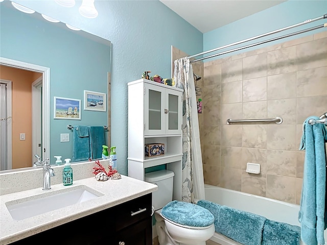 full bathroom with shower / bath combination with curtain, toilet, and vanity