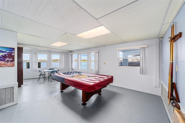 playroom with billiards and concrete floors