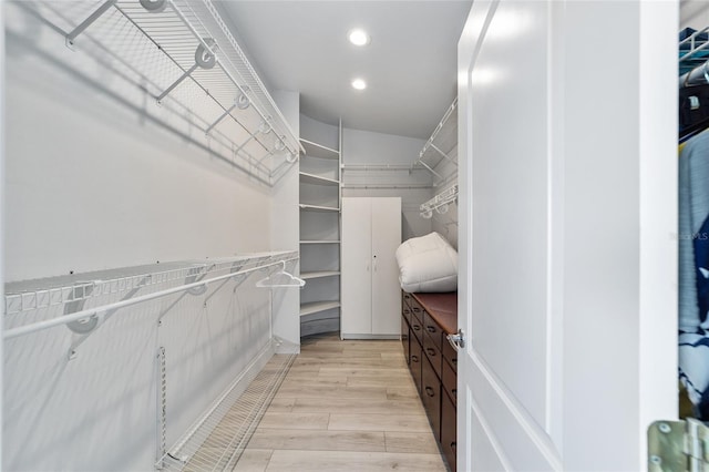 spacious closet with light wood-style flooring