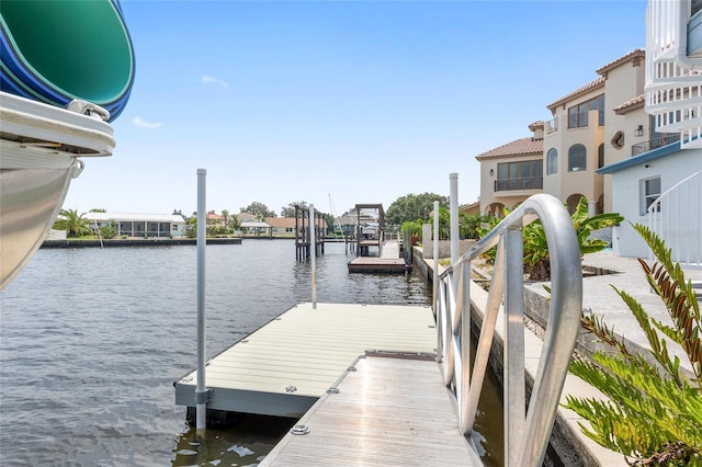 dock area with a water view