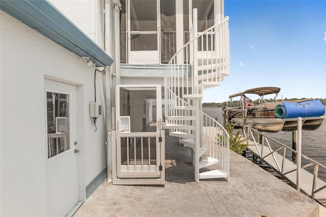 view of patio / terrace with a dock