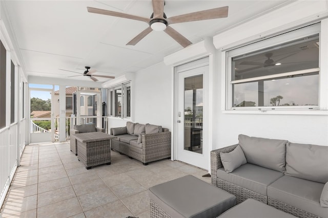 sunroom with ceiling fan