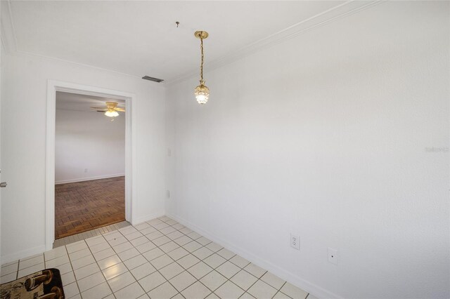 829 NE 15th Ave, Ocala, FL 34470 - spare room featuring light tile patterned floors, baseboards, ornamental molding, and a ceiling fan