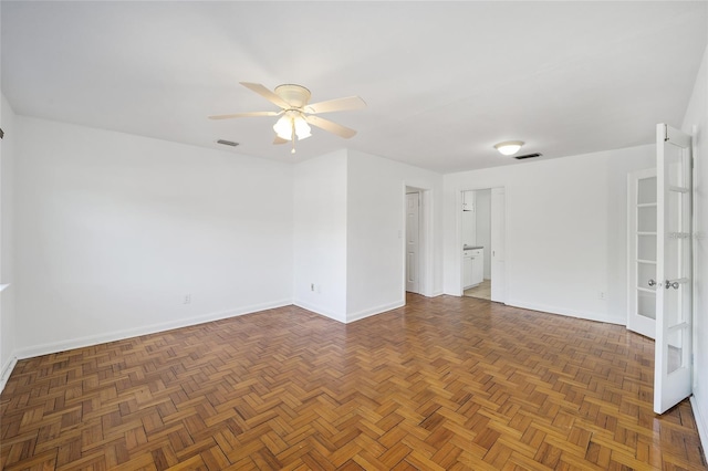 829 NE 15th Ave, Ocala, FL 34470 - unfurnished room featuring visible vents, baseboards, and a ceiling fan