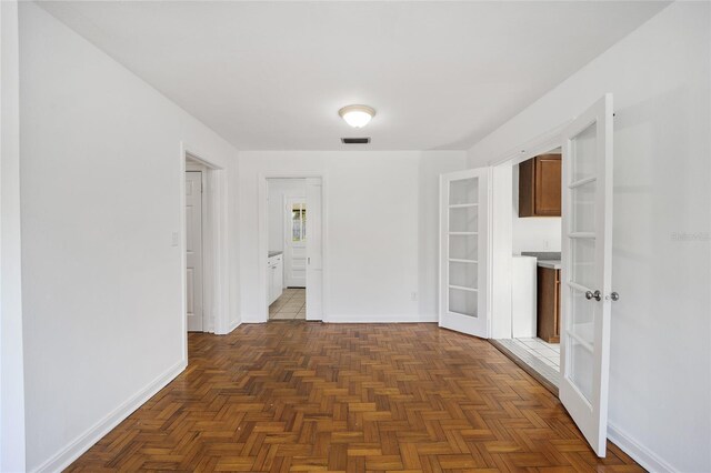 829 NE 15th Ave, Ocala, FL 34470 - unfurnished room featuring french doors, baseboards, and visible vents
