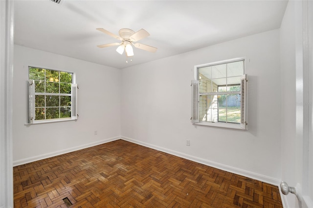 829 NE 15th Ave, Ocala, FL 34470 - unfurnished room featuring ceiling fan and baseboards
