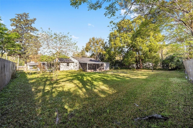 829 NE 15th Ave, Ocala, FL 34470 - view of yard with an outdoor structure and a fenced backyard