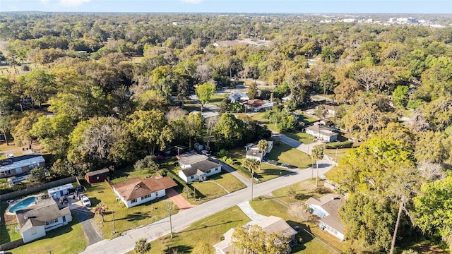 829 NE 15th Ave, Ocala, FL 34470 - drone / aerial view featuring a forest view and a residential view