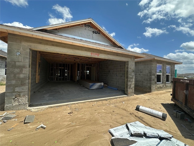4528 SW 90th Lane Rd, Ocala, FL 34476 - view of side of property with concrete block siding and a garage