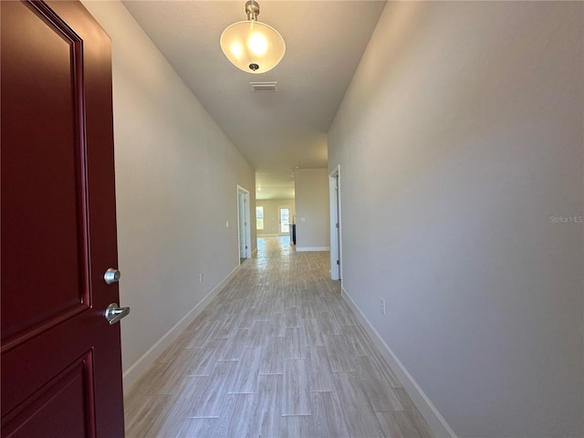 4528 SW 90th Lane Rd, Ocala, FL 34476 - hall featuring light wood-type flooring and baseboards