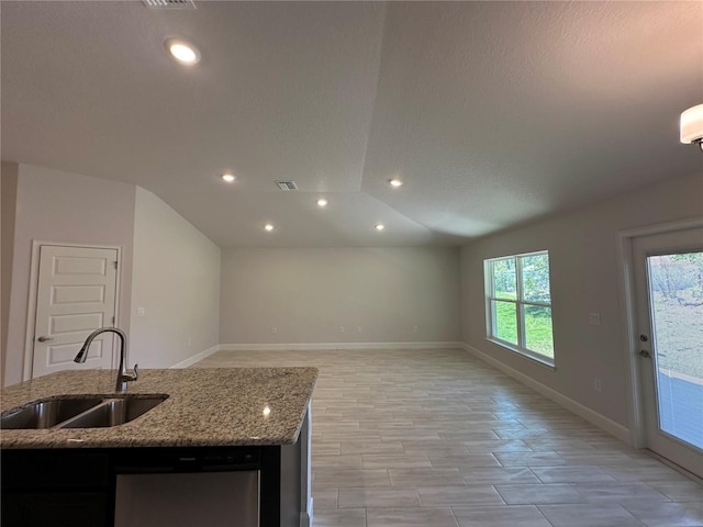4528 SW 90th Lane Rd, Ocala, FL 34476 - kitchen featuring a sink, lofted ceiling, light stone counters, a center island with sink, and open floor plan
