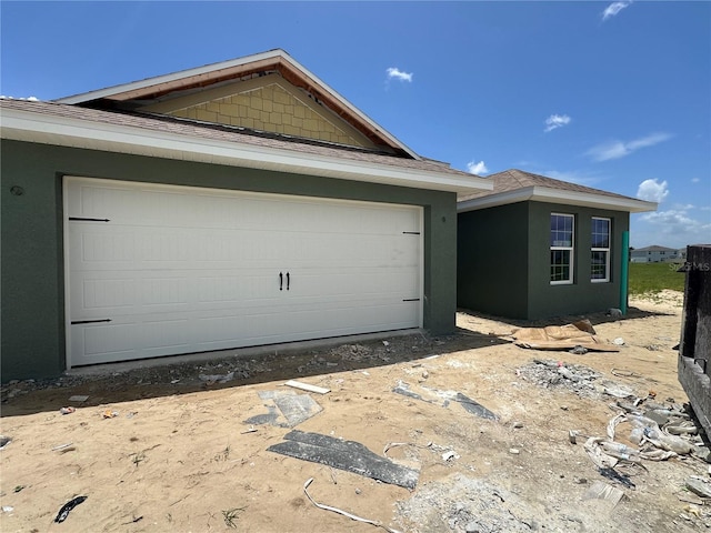 4528 SW 90th Lane Rd, Ocala, FL 34476 - view of front facade featuring stucco siding