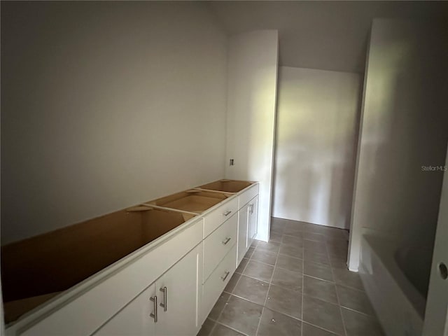 4528 SW 90th Lane Rd, Ocala, FL 34476 - bathroom with tile patterned flooring and a bath