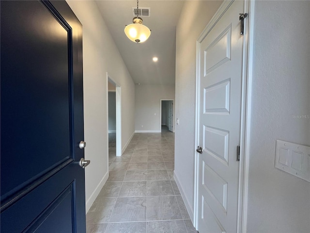 4498 SW 90th Lane Rd, Ocala, FL 34476 - corridor featuring light tile patterned floors, baseboards, and recessed lighting