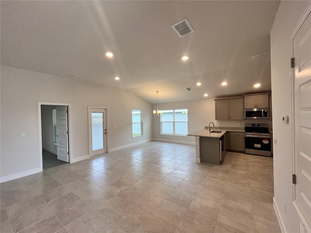 4498 SW 90th Lane Rd, Ocala, FL 34476 - kitchen featuring appliances with stainless steel finishes, open floor plan, recessed lighting, a sink, and light countertops