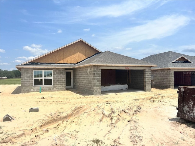 4498 SW 90th Lane Rd, Ocala, FL 34476 - property under construction featuring a garage and roof with shingles