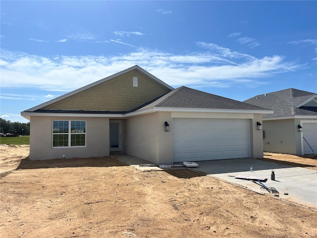 4498 SW 90th Lane Rd, Ocala, FL 34476 - ranch-style home featuring stucco siding, a garage, concrete driveway, and roof with shingles
