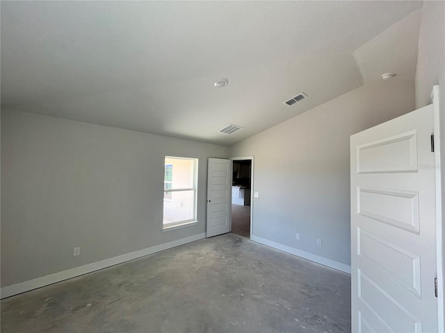 4498 SW 90th Lane Rd, Ocala, FL 34476 - unfurnished bedroom featuring concrete floors and lofted ceiling