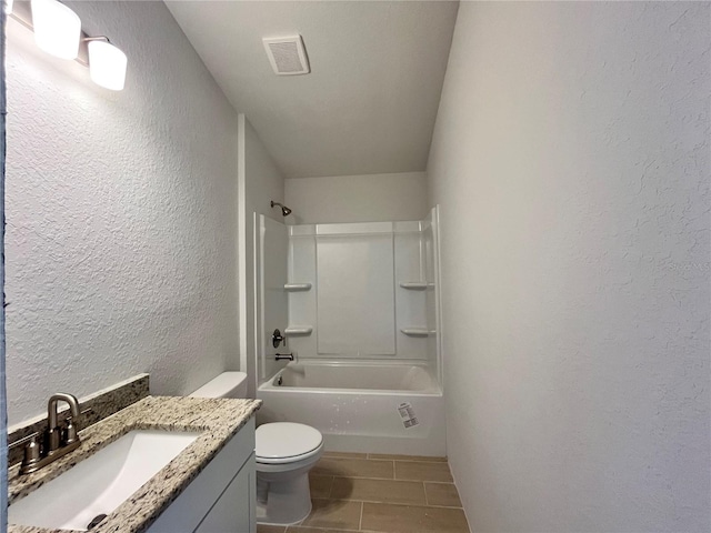 4498 SW 90th Lane Rd, Ocala, FL 34476 - full bath with vanity, tub / shower combination, tile patterned floors, and a textured wall