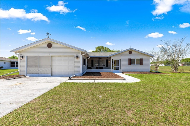 10980 SW 62nd Avenue Rd, Ocala, FL 34476 - single story home featuring a front yard, an attached garage, driveway, and a sunroom