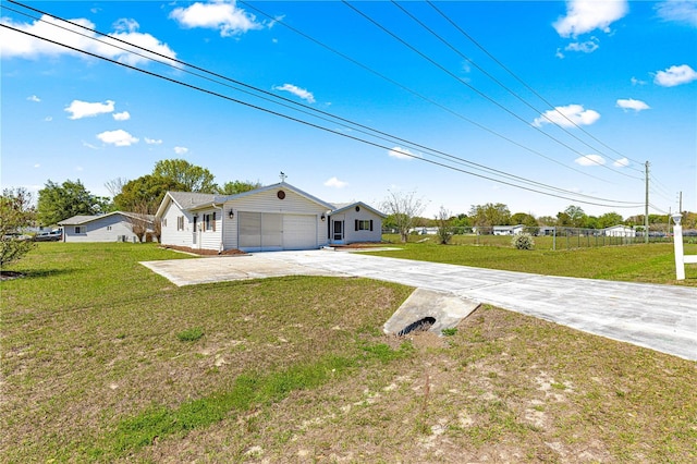 10980 SW 62nd Avenue Rd, Ocala, FL 34476 - single story home featuring an attached garage, concrete driveway, and a front yard