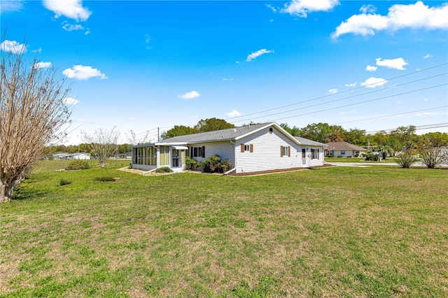 10980 SW 62nd Avenue Rd, Ocala, FL 34476 - exterior space with a yard and a sunroom