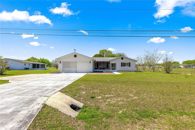 10980 SW 62nd Avenue Rd, Ocala, FL 34476 - view of front of property with concrete driveway, a garage, fence, and a front lawn