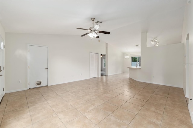 9 Hemlock Run, Ocala, FL 34472 - unfurnished living room featuring a ceiling fan, light tile patterned floors, and lofted ceiling