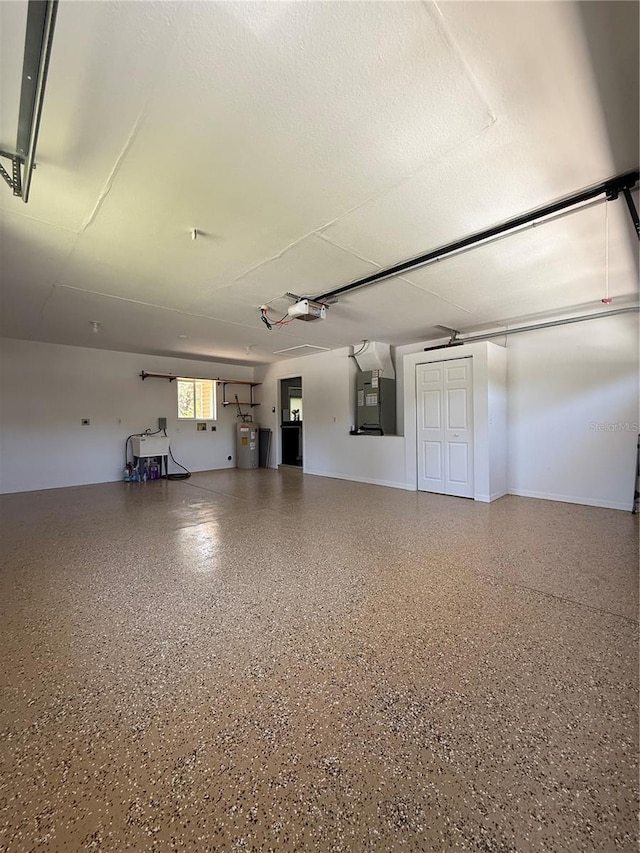 9090 SE 135th Loop, Summerfield, FL 34491 - garage featuring water heater, a garage door opener, and heating unit