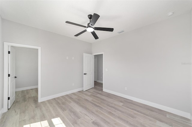 760 NE 152nd Ter, Williston, FL 32696 - unfurnished bedroom with visible vents, light wood-style floors, baseboards, ceiling fan, and a spacious closet