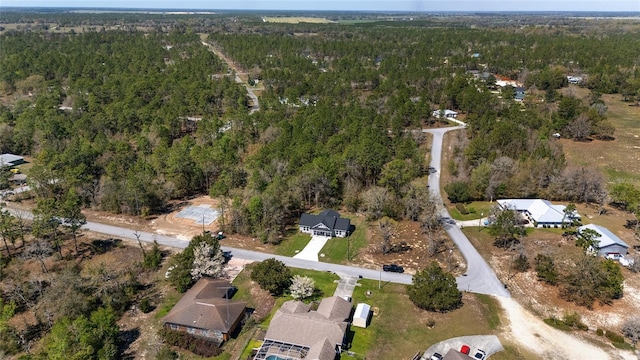 760 NE 152nd Ter, Williston, FL 32696 - birds eye view of property with a view of trees