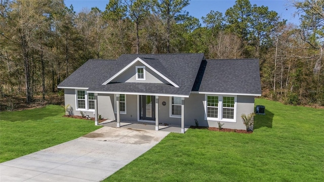 760 NE 152nd Ter, Williston, FL 32696 - view of front facade with a shingled roof, driveway, and stucco siding