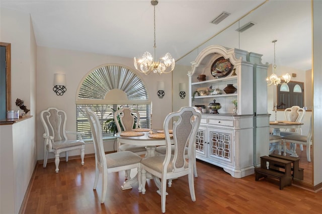 5557 N Sierra Ter, Beverly Hills, FL 34465 - dining room with baseboards, wood finished floors, a notable chandelier, and visible vents