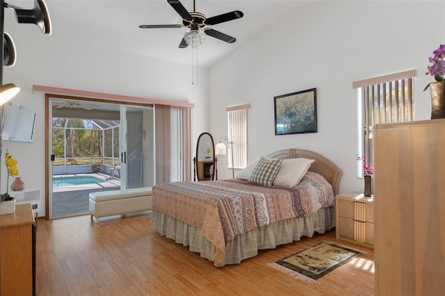 5557 N Sierra Ter, Beverly Hills, FL 34465 - bedroom featuring light wood-style flooring, access to exterior, high vaulted ceiling, and a ceiling fan