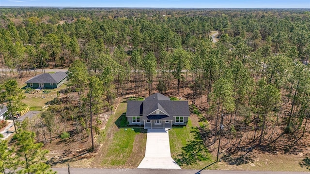 791 NE 150th Ave, Williston, FL 32696 - birds eye view of property with a wooded view