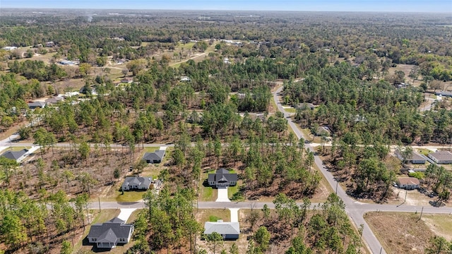 791 NE 150th Ave, Williston, FL 32696 - birds eye view of property with a wooded view