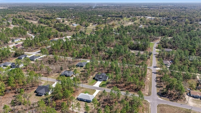 791 NE 150th Ave, Williston, FL 32696 - drone / aerial view with a wooded view