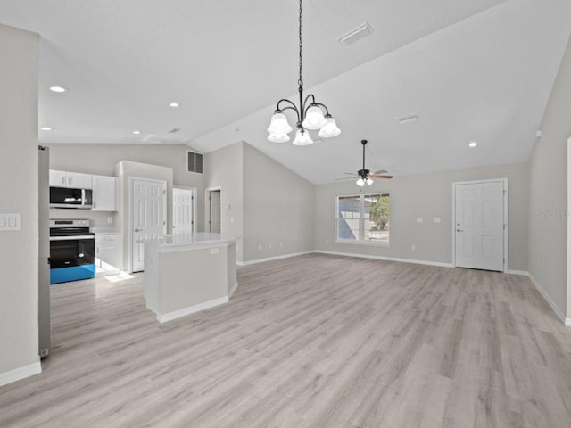 3 Pine Court Ln, Ocala, FL 34472 - unfurnished living room featuring light wood-style floors, baseboards, ceiling fan with notable chandelier, and vaulted ceiling